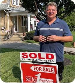 Happy homeowner knowing that he saved big using Sell for 1 Percent